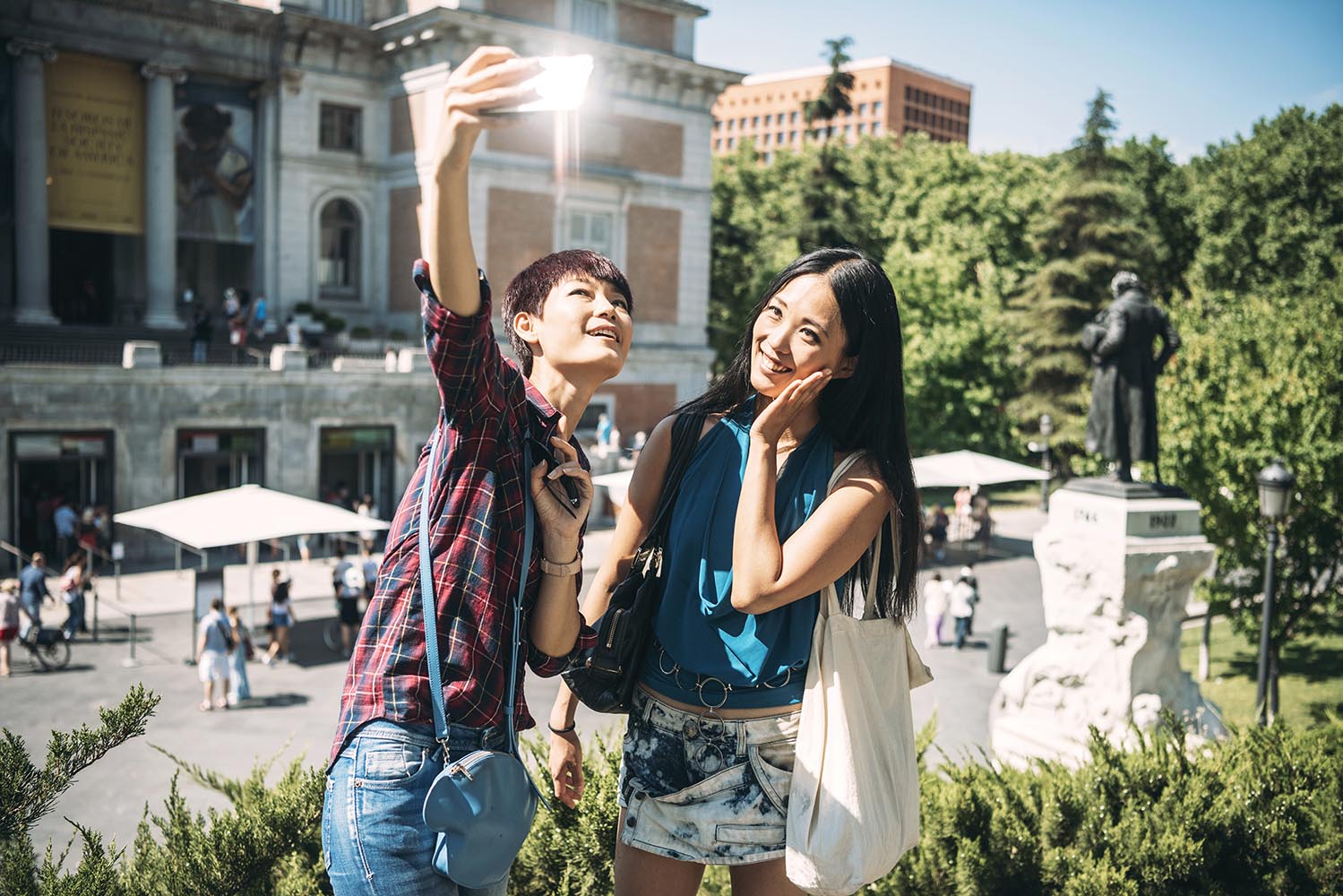 Asian women taking selfie at museum