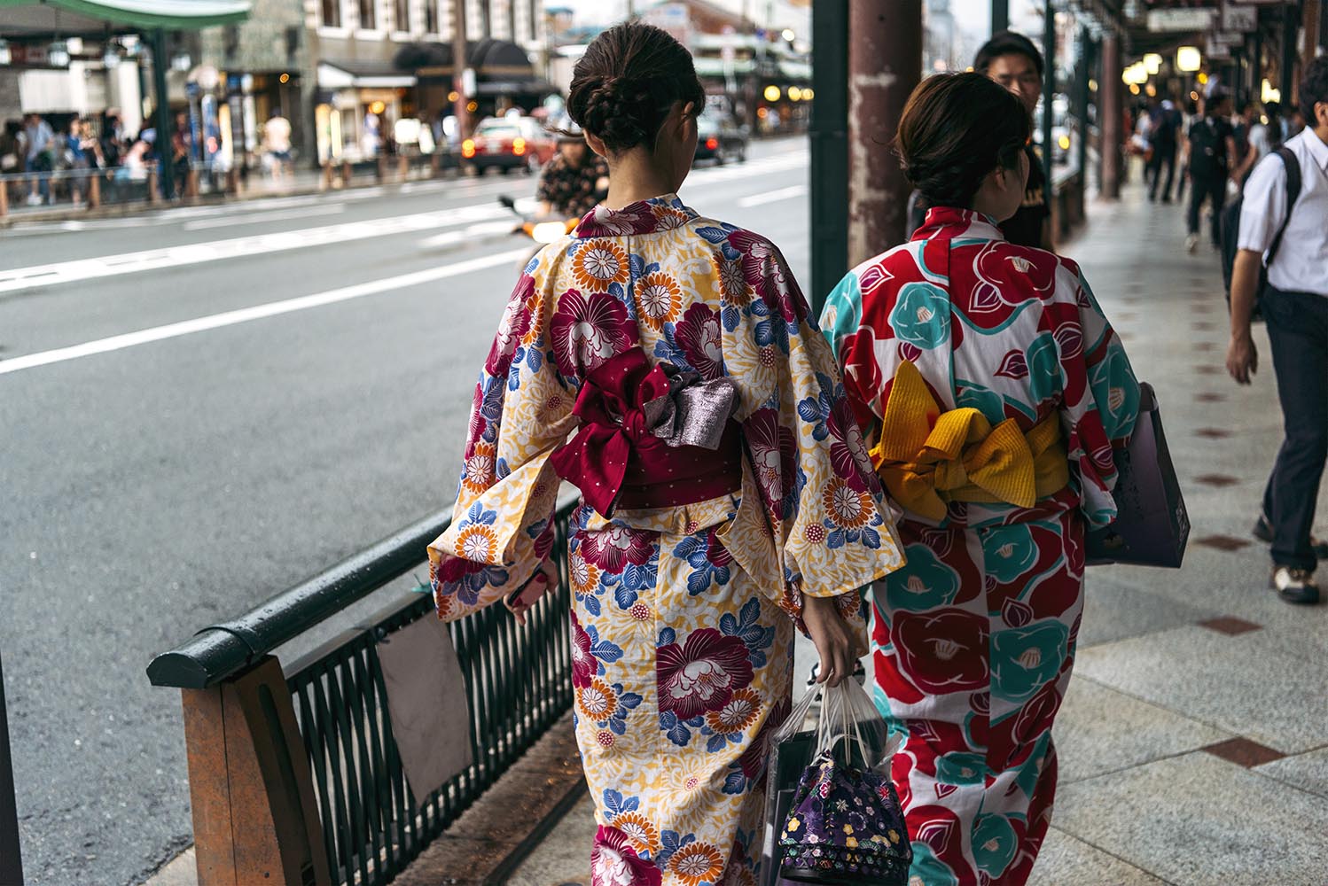 Two women wearing kimono in the streest of Kyoto, Japan