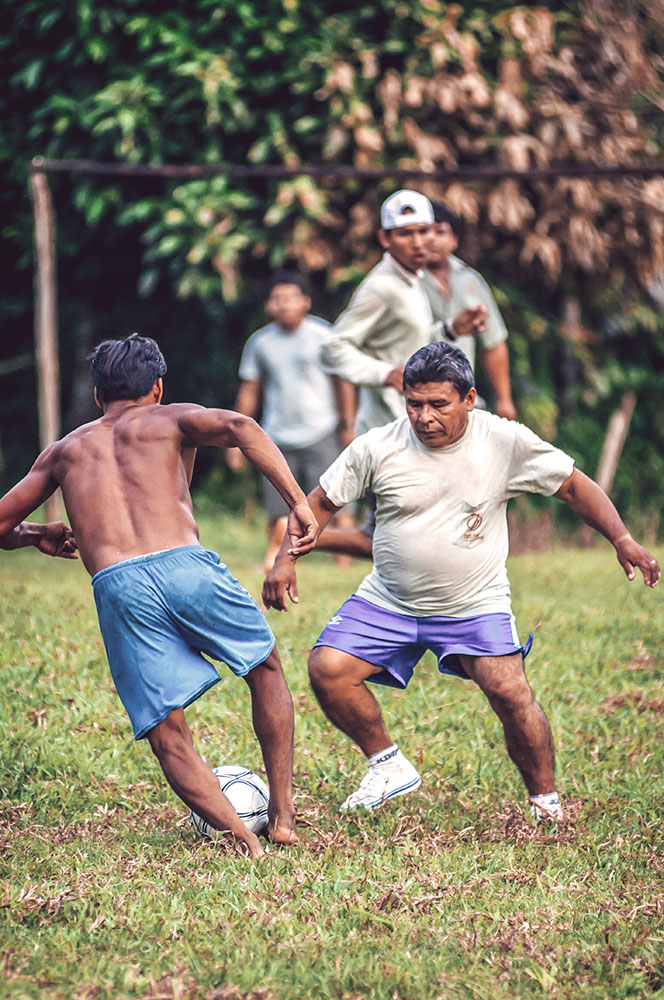 LORETO, PERU - JANUARY 02: Unidentified locals playing football