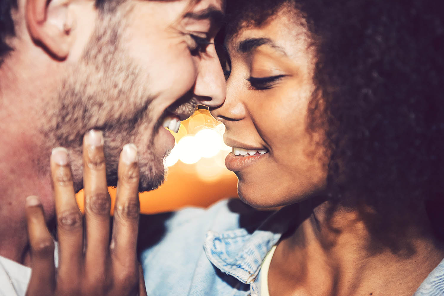 Beautiful interracial couple showing their love.