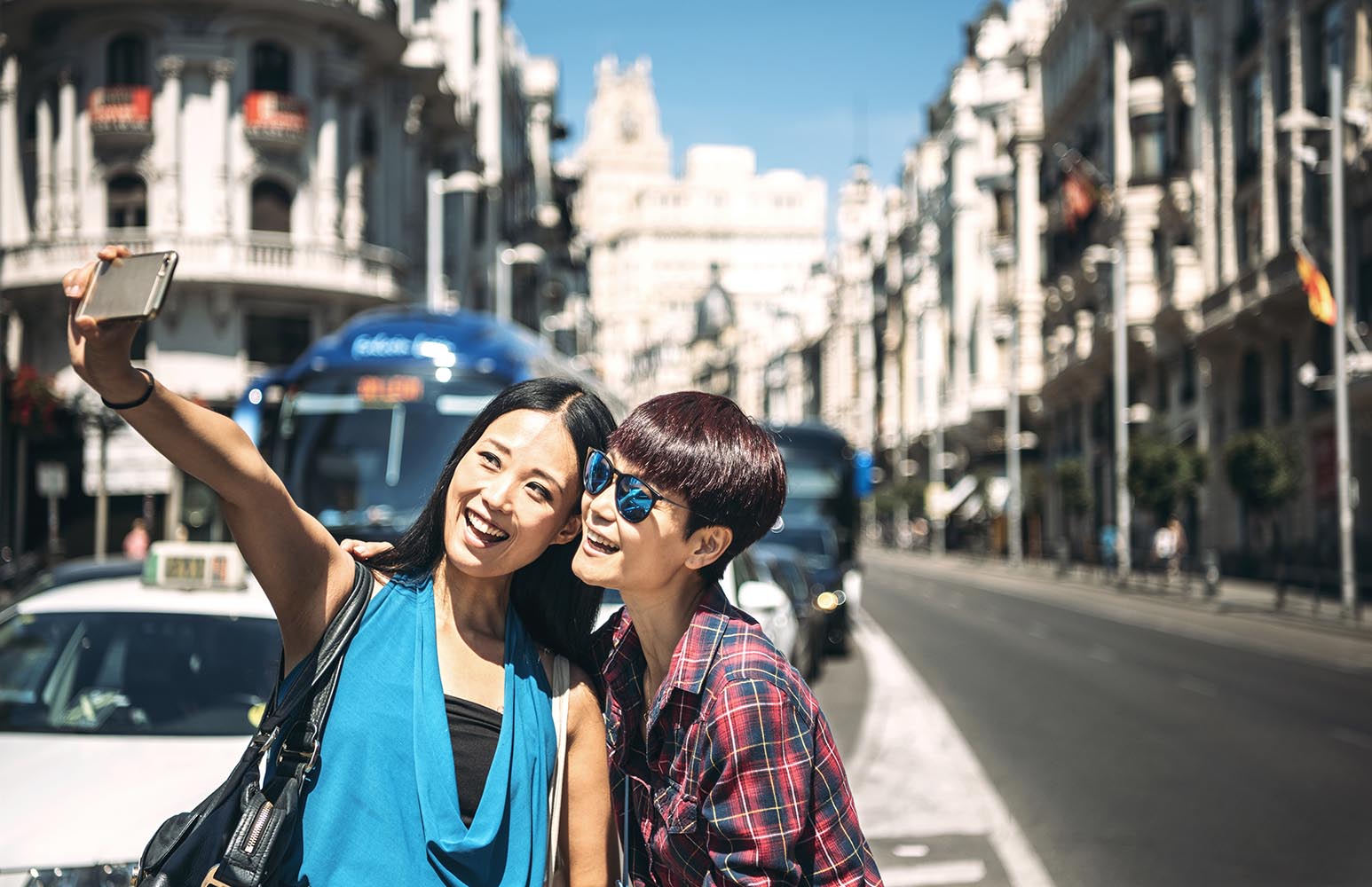 Tourists taking selfie on street