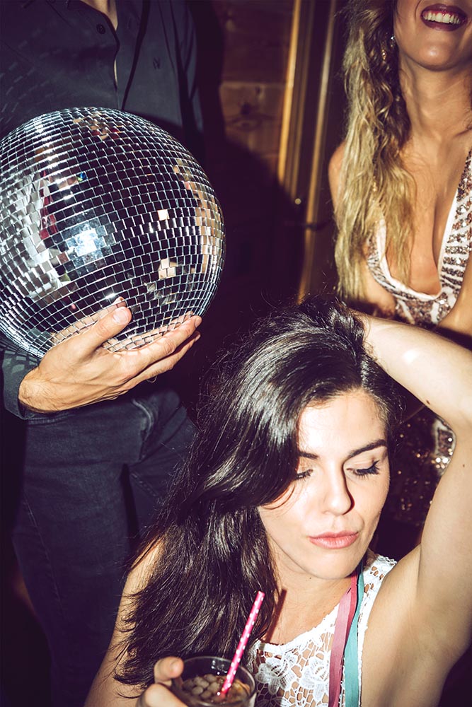 People on party with disco ball