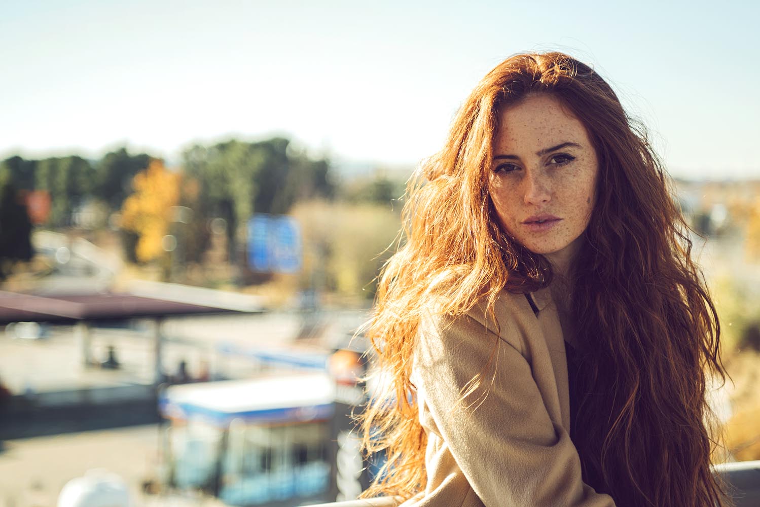 Beautiful redhead woman in sunlight