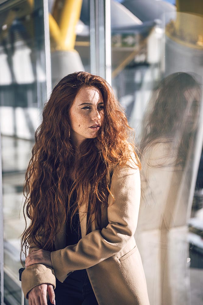 Woman with red hair in airport